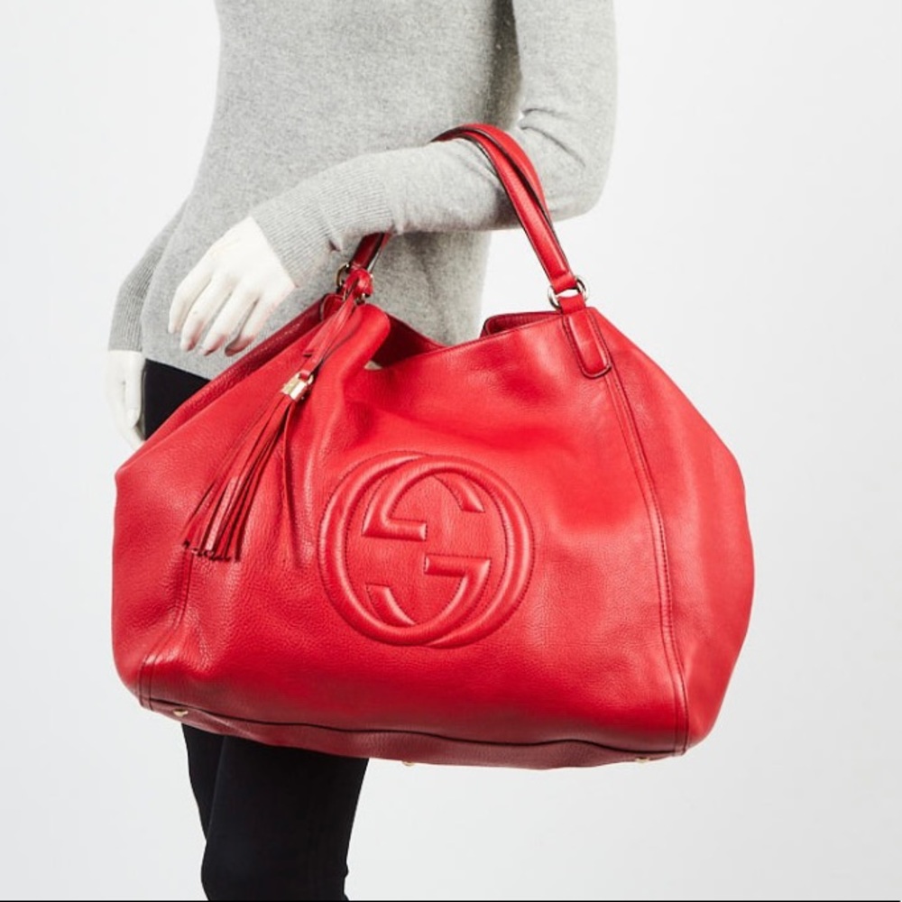 Authentic red pebble leather SOHO purse.